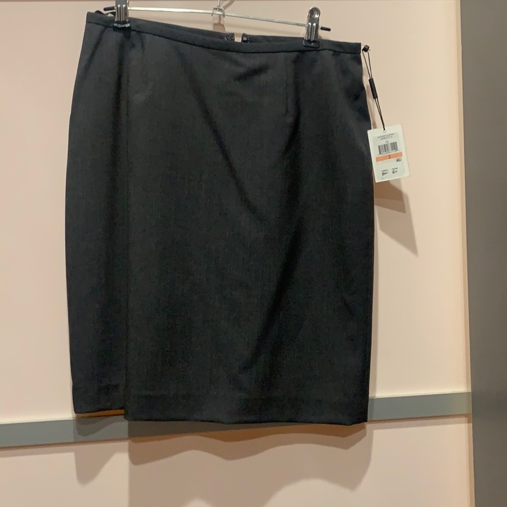 Dark grey Calvin Klein suit skirt. Versatile and sophisticated. New, tags on